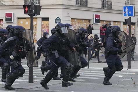 French police counter protest violence; garbage strike ends
